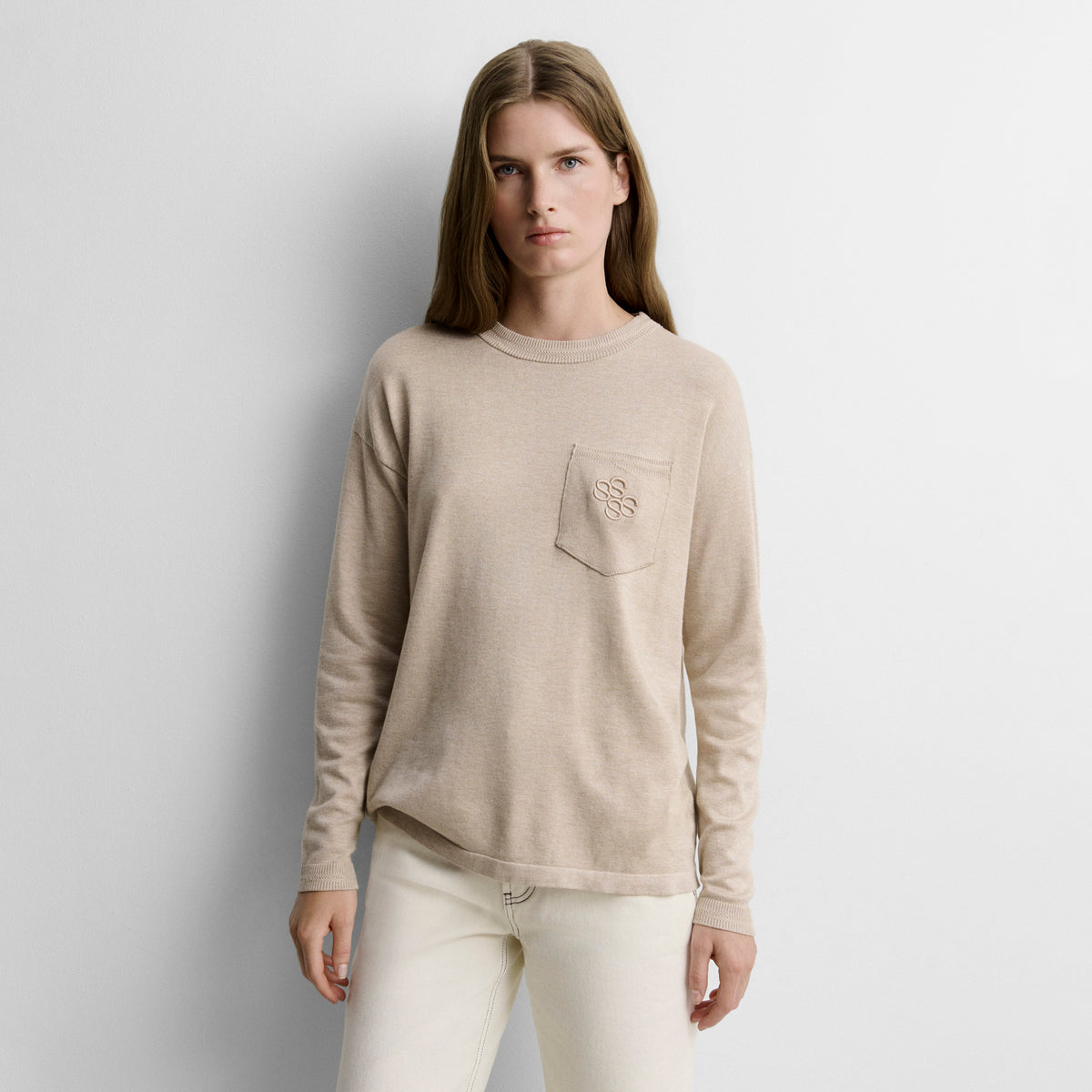Pull en tricot poche