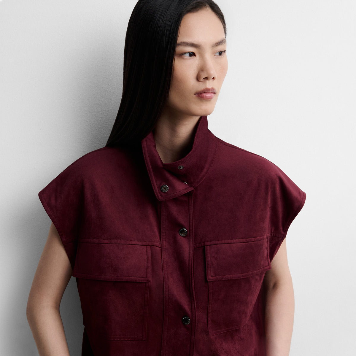 Faux suede top with funnel neck