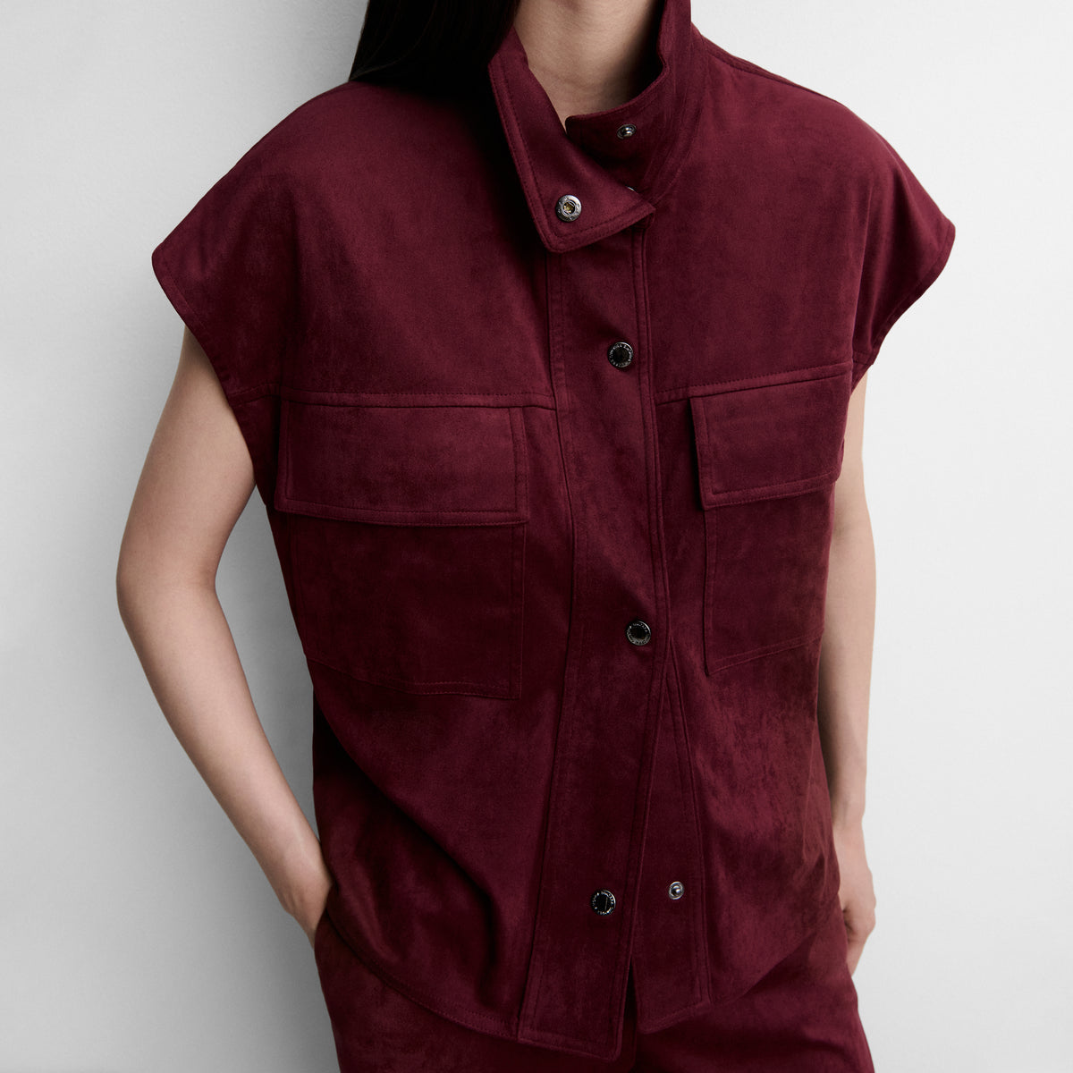 Faux suede top with funnel neck