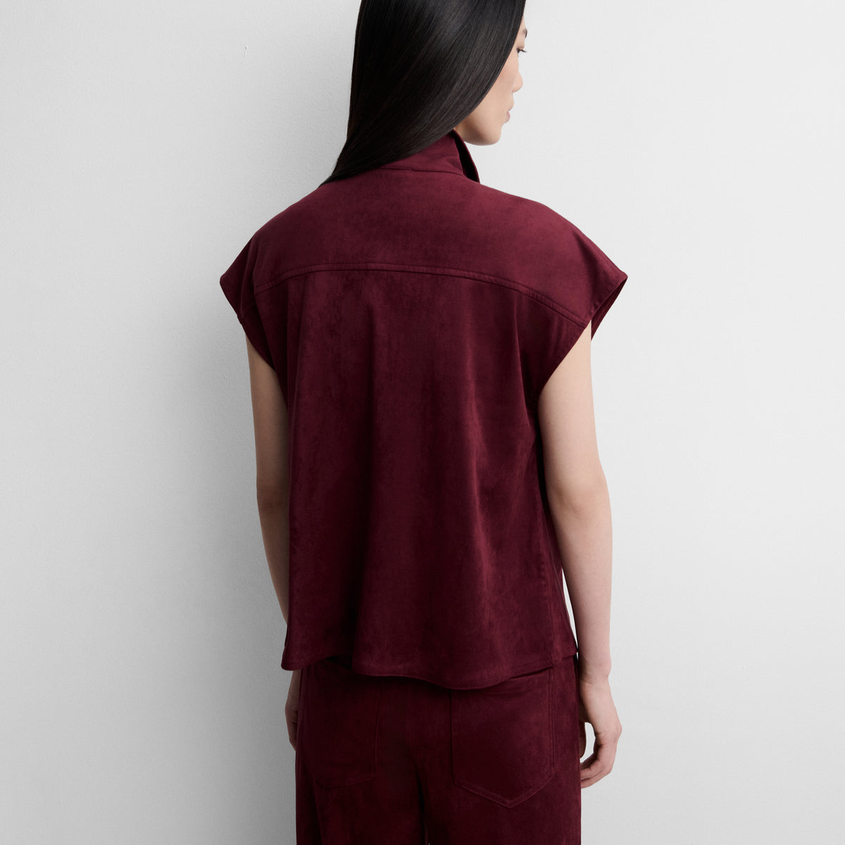 Faux suede top with funnel neck