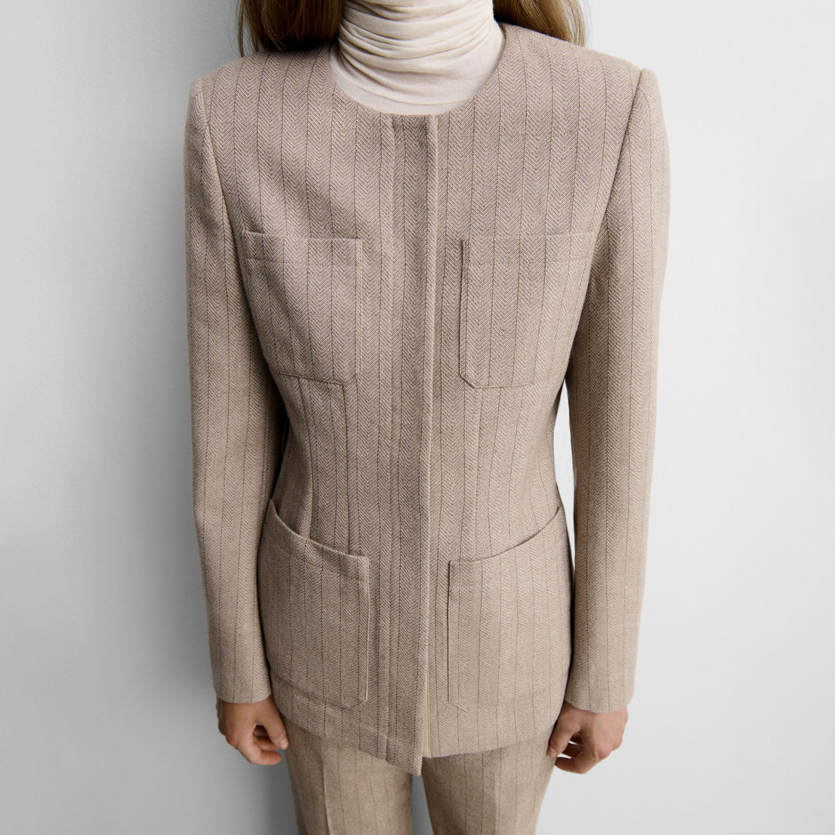 Chaqueta espiga cinturón