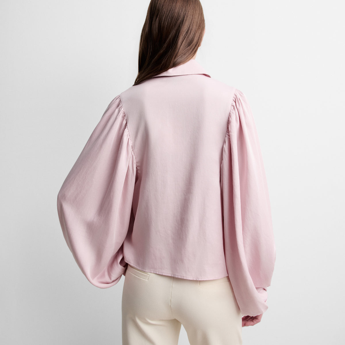 Blusa cremallera manga abullonada