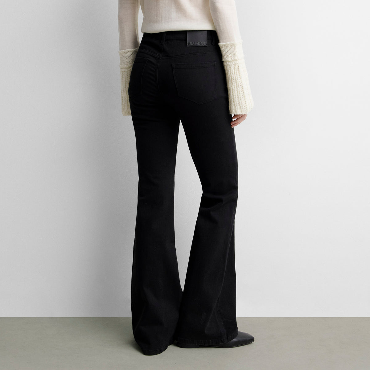 Flared denim trousers