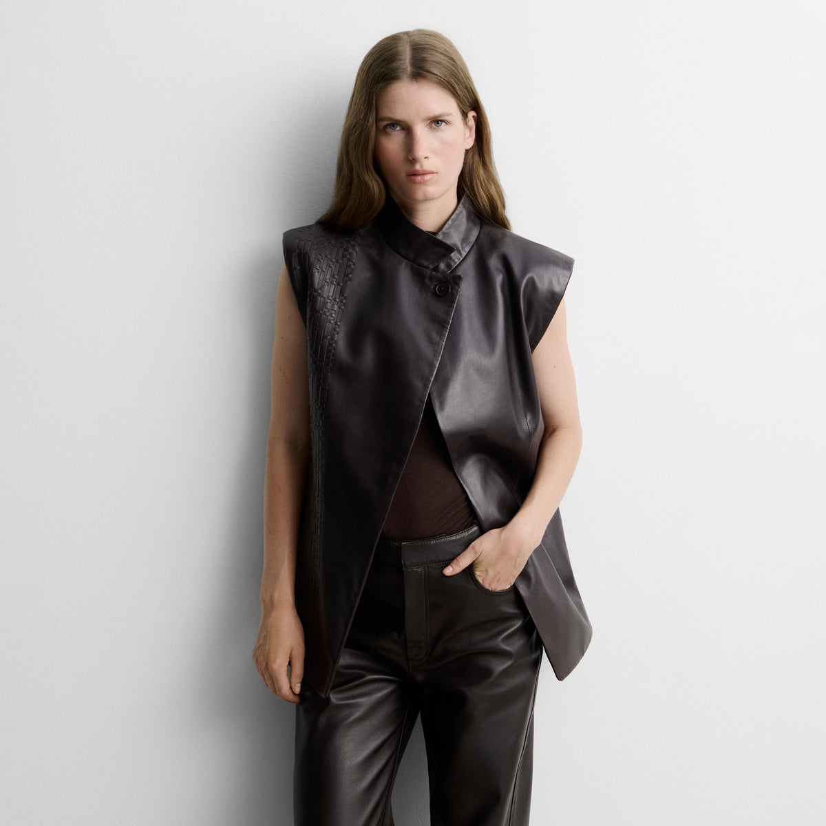 Faux leather gilet with woven straps