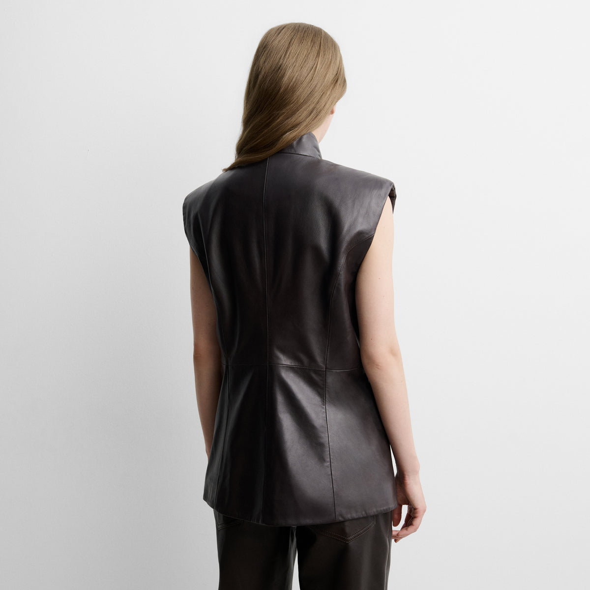 Faux leather gilet with woven straps