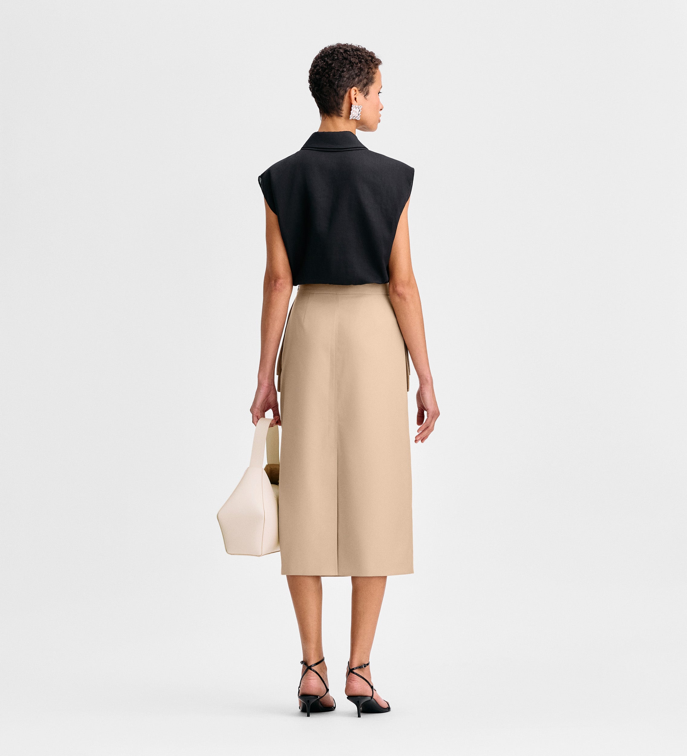 Falda midi detalle bolsillos