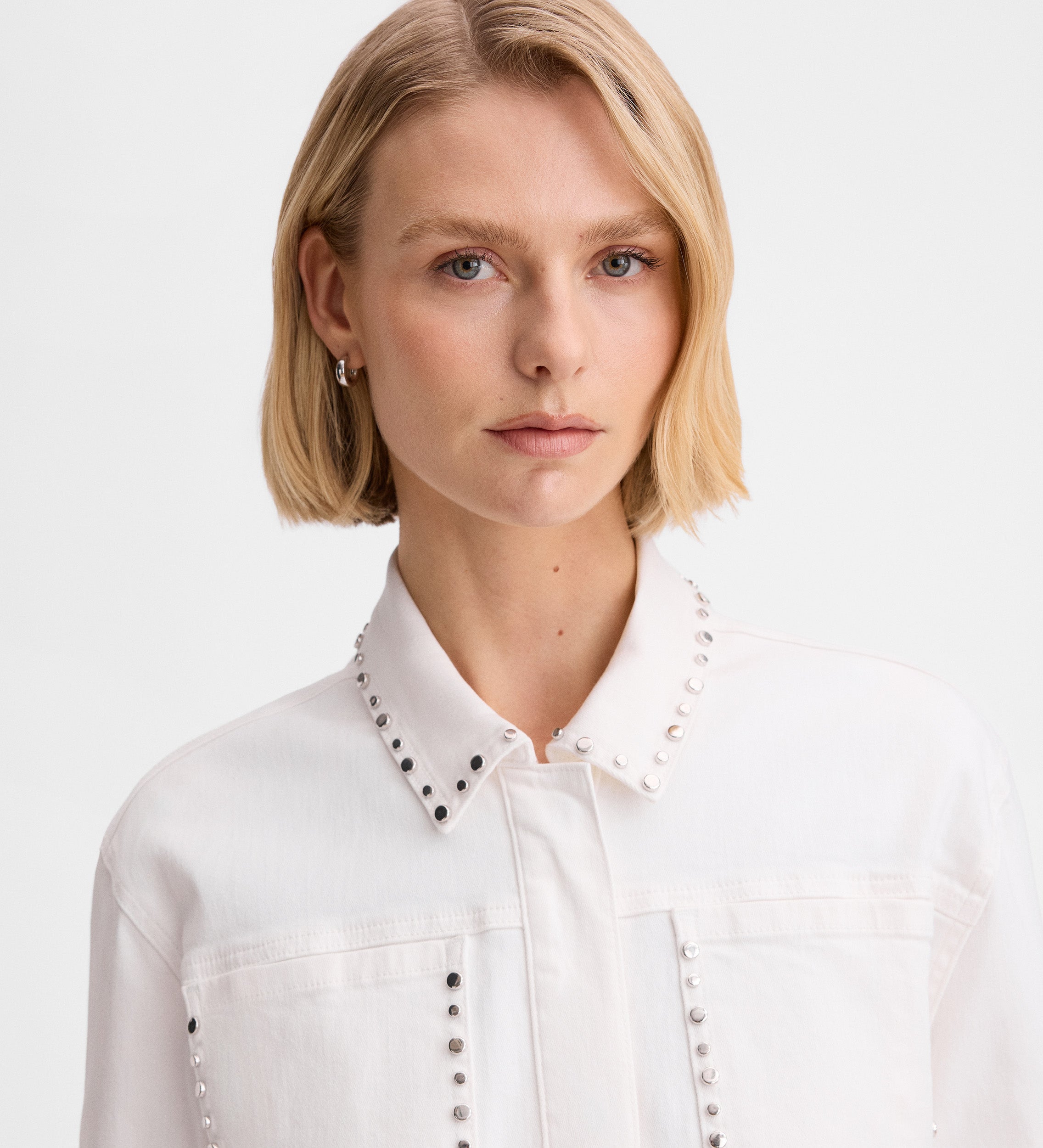 Denim overshirt rivets