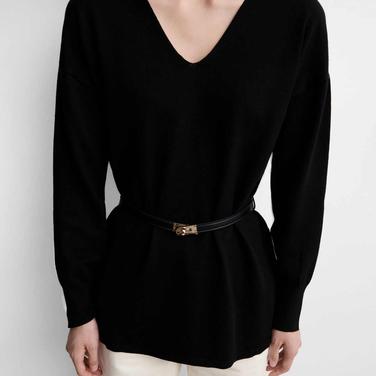 Two-tone sweater with belt