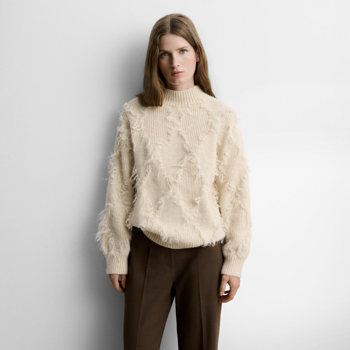 Fringed diamond-pattern sweater