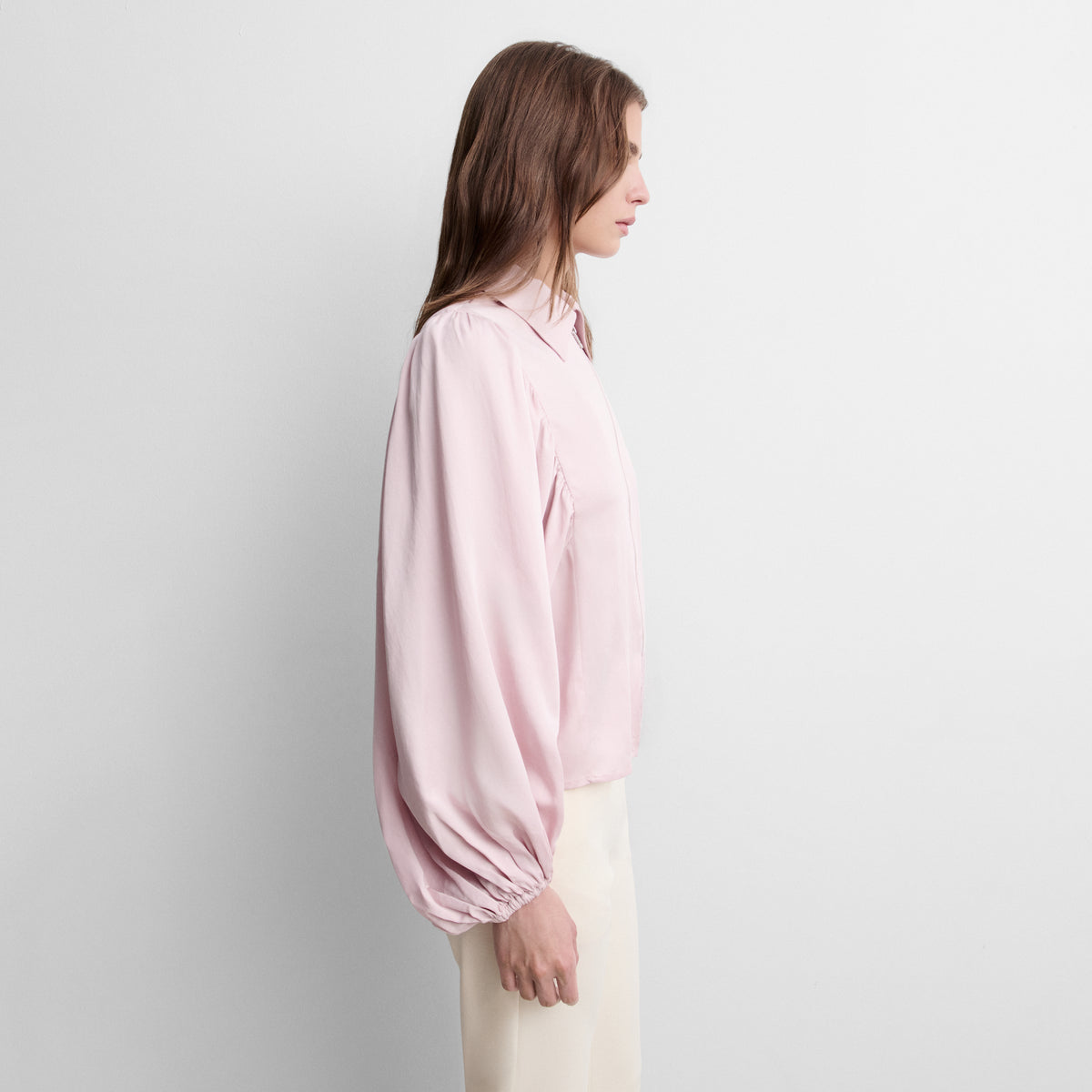 Blusa cremallera manga abullonada