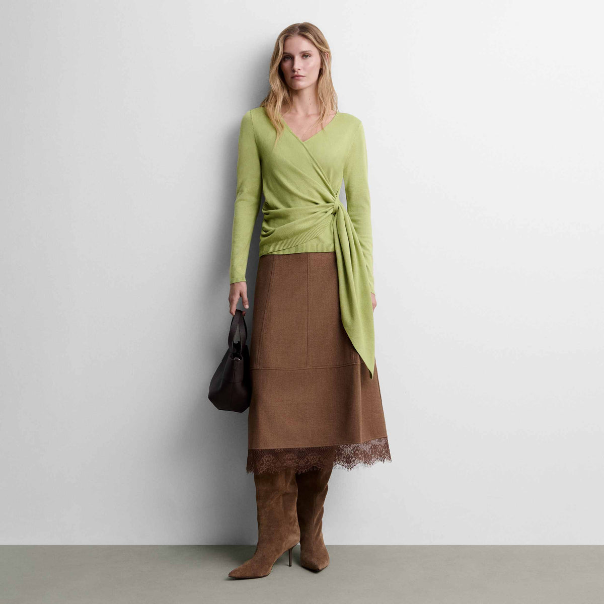 Knit sweater with bow detail
