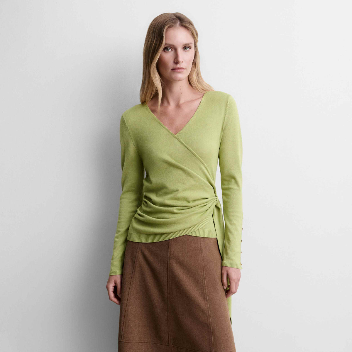 Knit sweater with bow detail