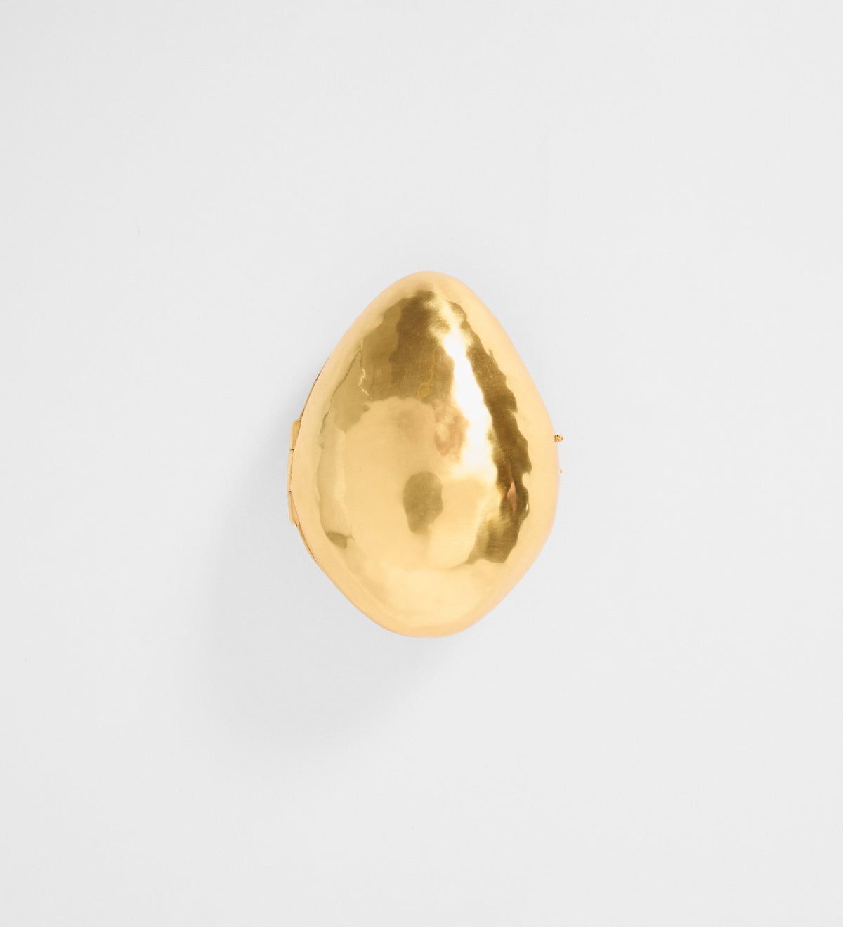 Broche dorado relicario