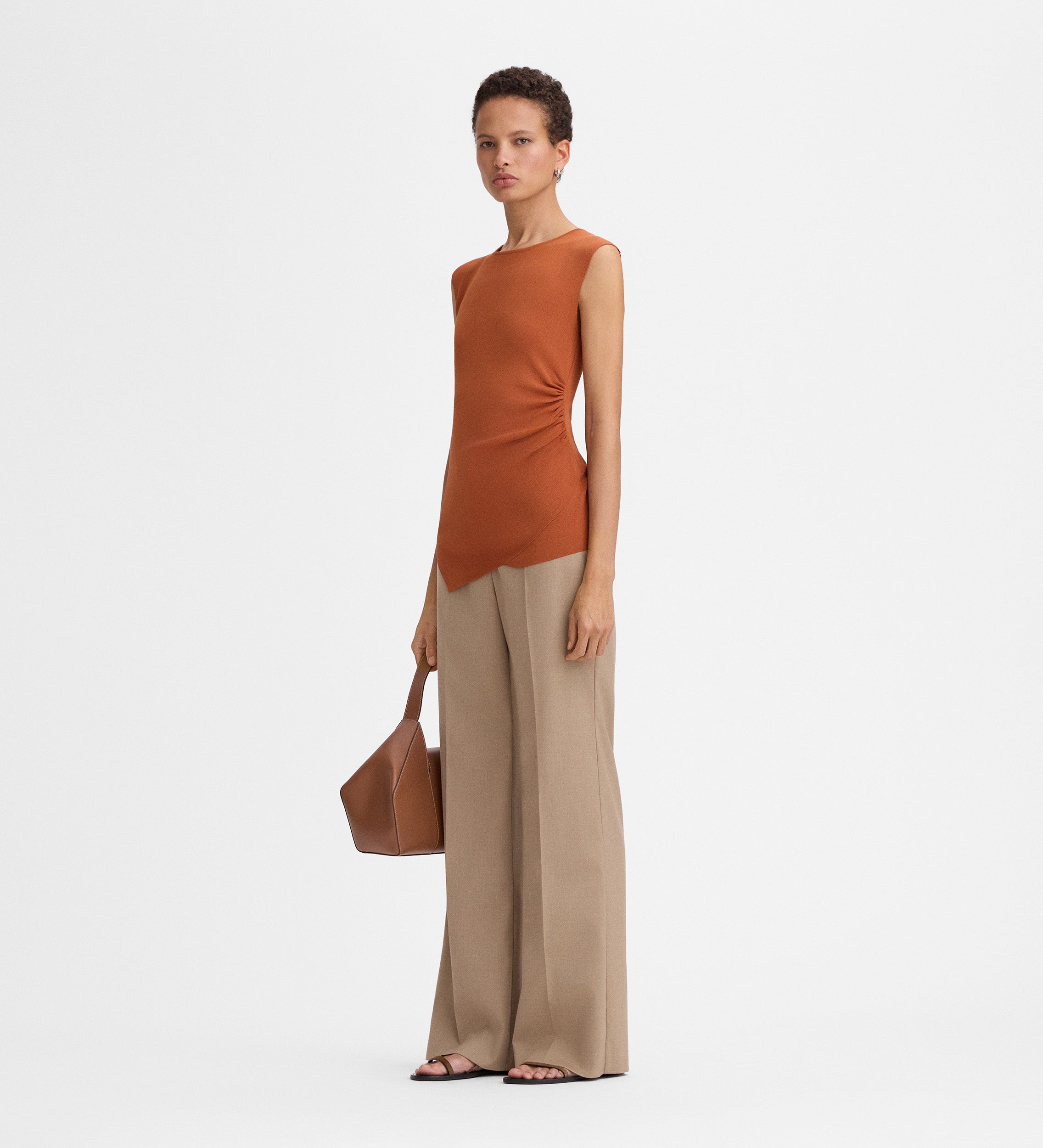 Top punto asimétrico