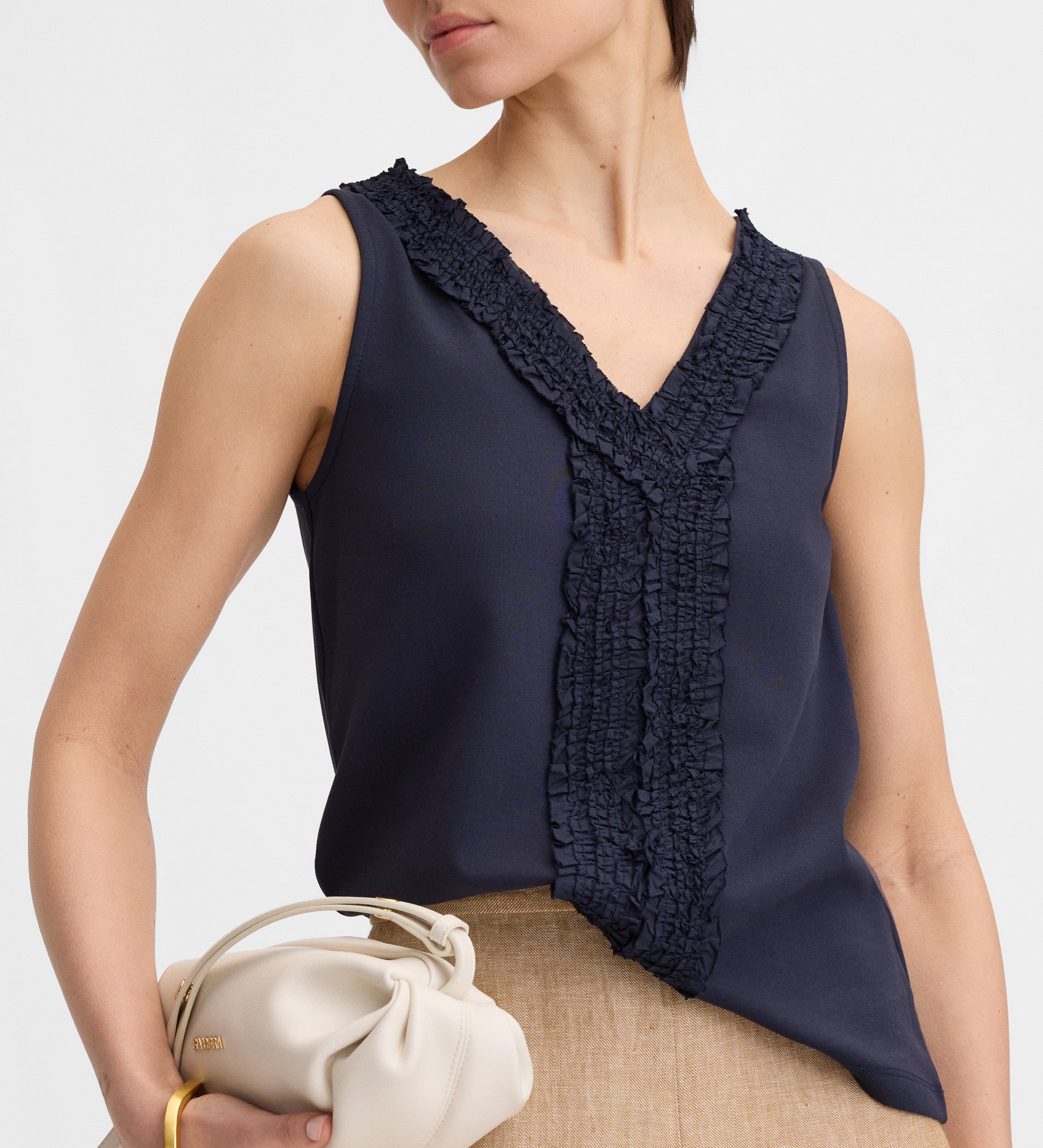 Textile embroidered top