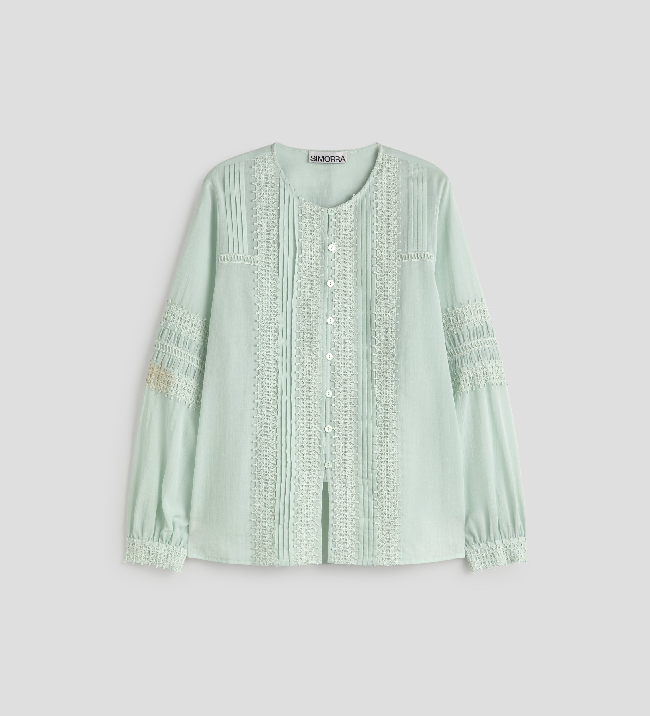 Blusa con pasamanerias
